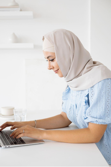 nurse working at a computer